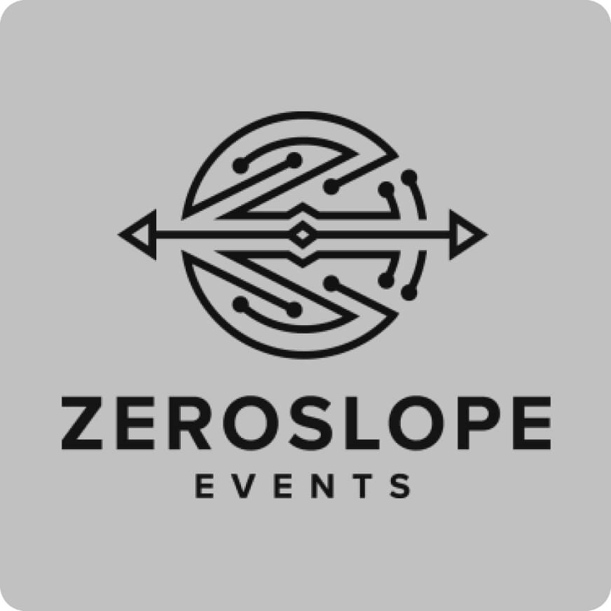 Logo for ZeroSlope Events featuring a stylized "Z" with circuit-like lines and arrows, inspired by Vibecoding con AI expert, inside a circle above the company name on a gray background.