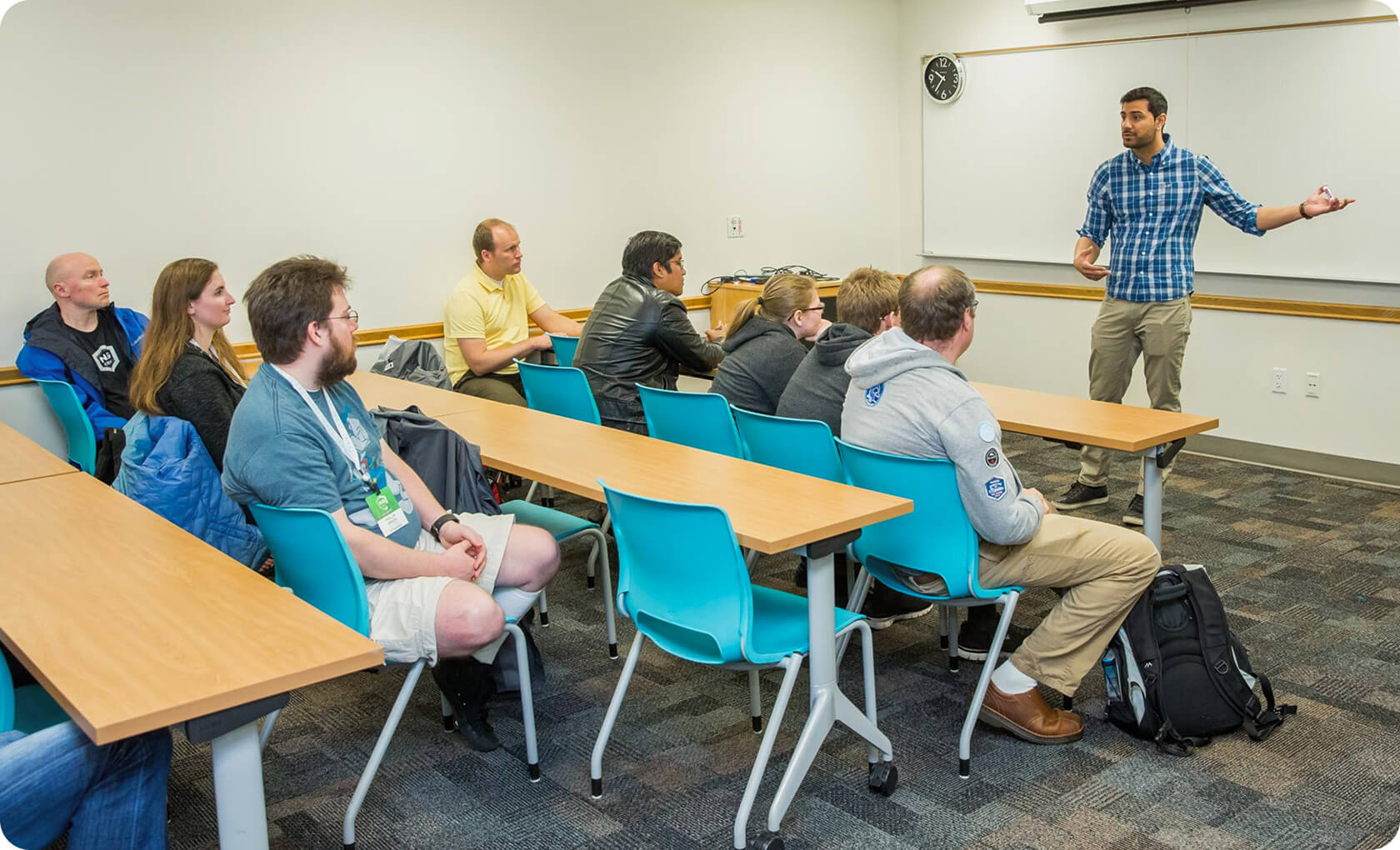classroom setting instructor talking in front